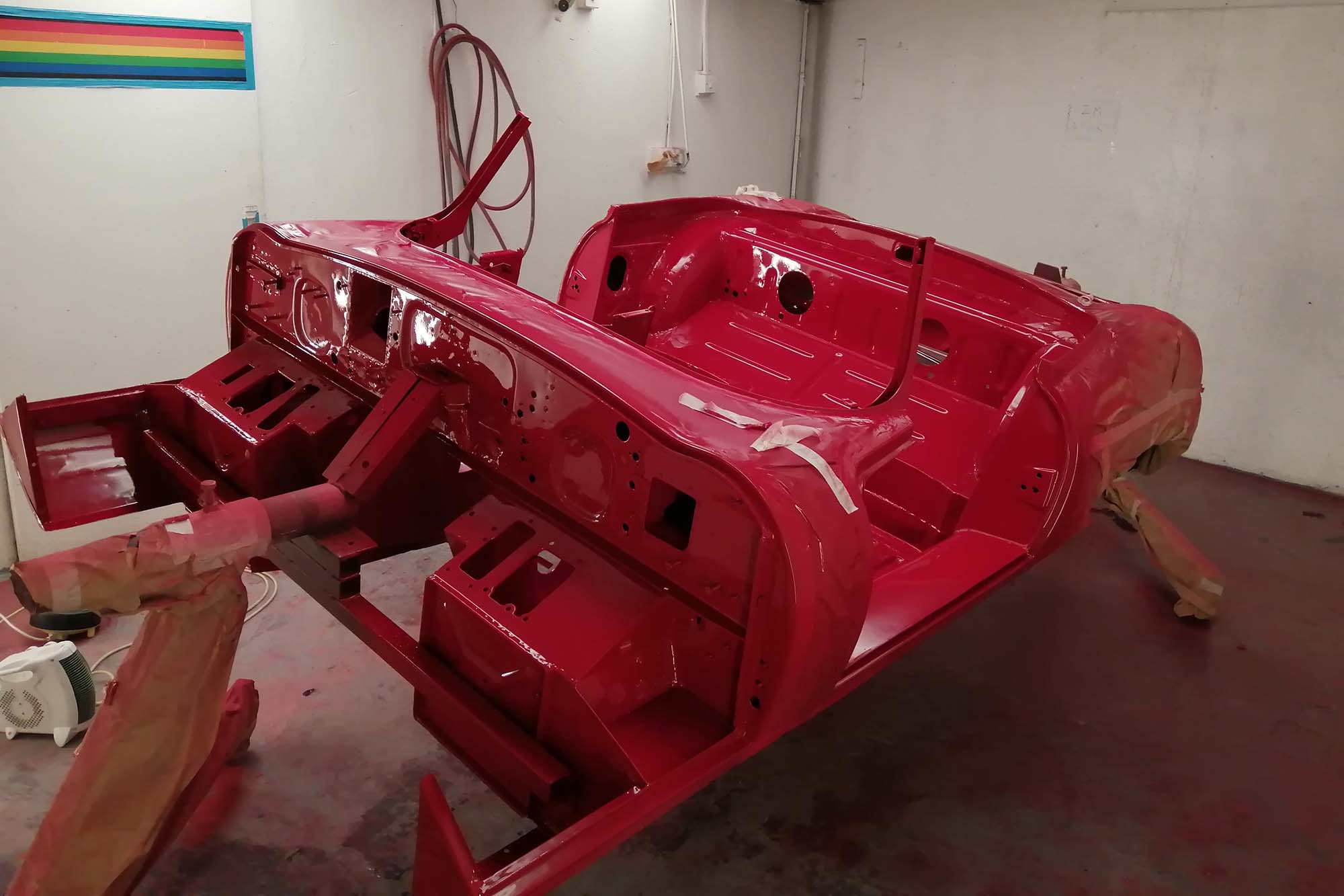 Red Jaguar E-Type Convertible body restoration